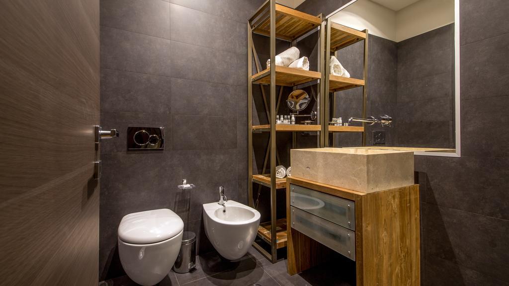 Qt Suites Roma الغرفة الصورة