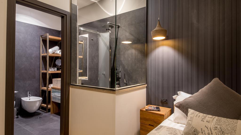 Qt Suites Roma الغرفة الصورة